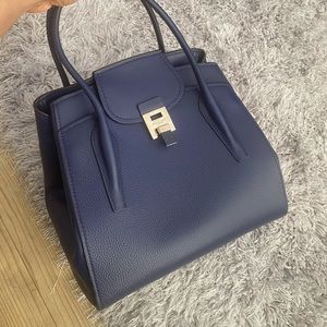 Michael Kors Structured Leather Hand Bag.